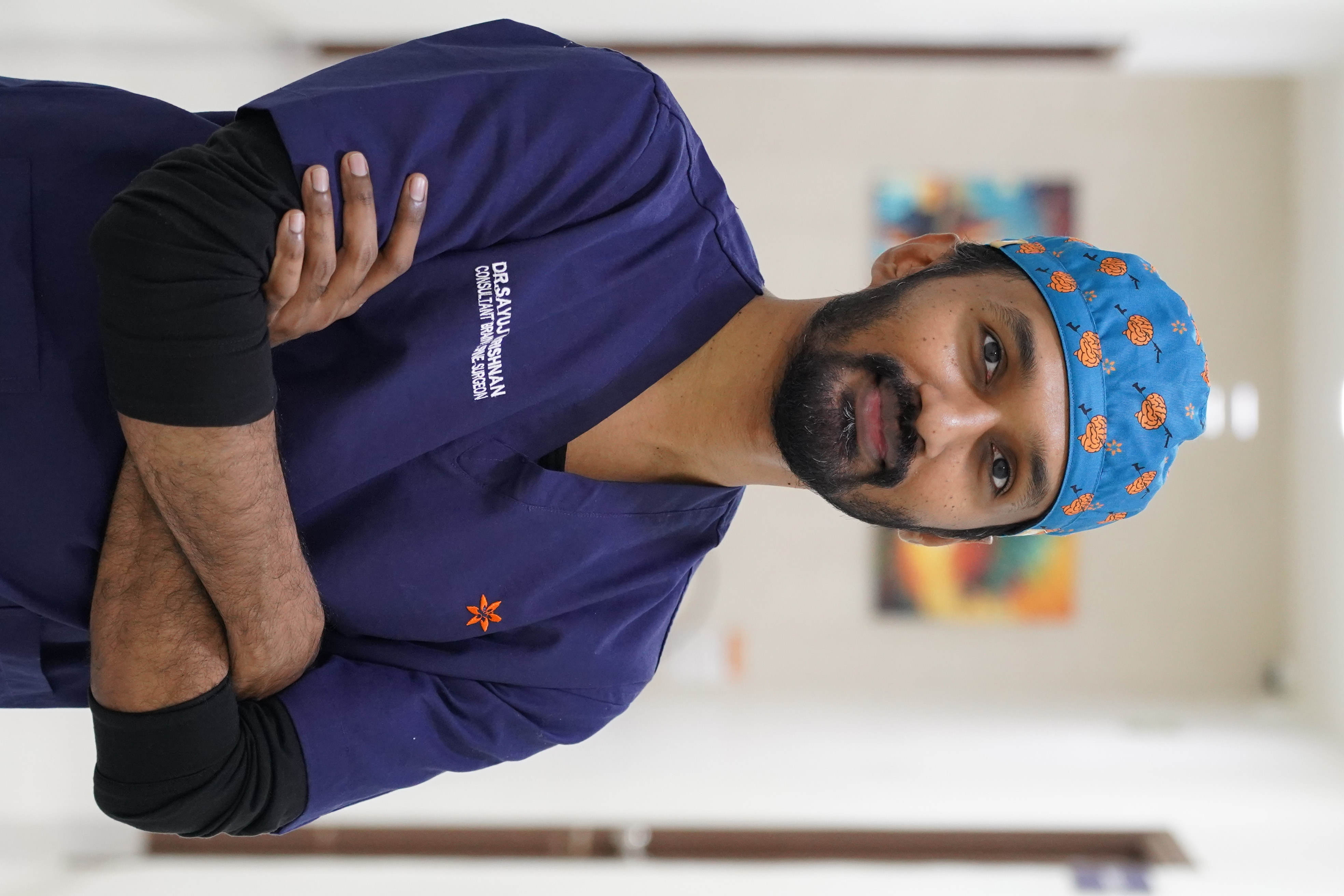 Dr. Sayuj Krishnan — Consultant Neurosurgeon & Spine Surgeon